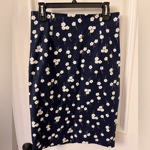 Boden pencil skirt. Navy with white flowers. Has slit in back